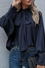 Load image into Gallery viewer, Navy Blue Satin Buttoned Cuffs Bishop Sleeve Tie Neck Blouse
