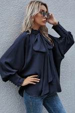 Load image into Gallery viewer, Navy Blue Satin Buttoned Cuffs Bishop Sleeve Tie Neck Blouse
